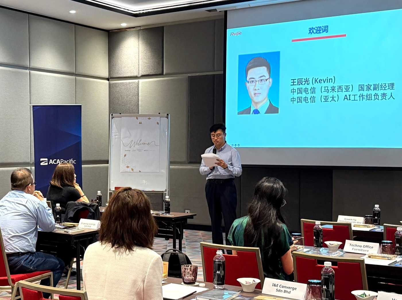 Kevin Wang Chenguang delivering the welcome address