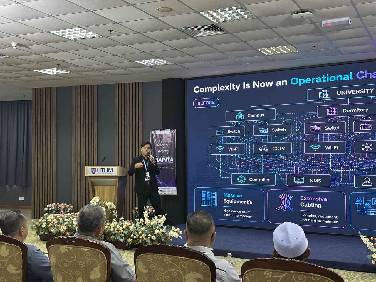 Muhammad Ariff presenting Simplifying Digital Infrastructure Operations at MAPITA