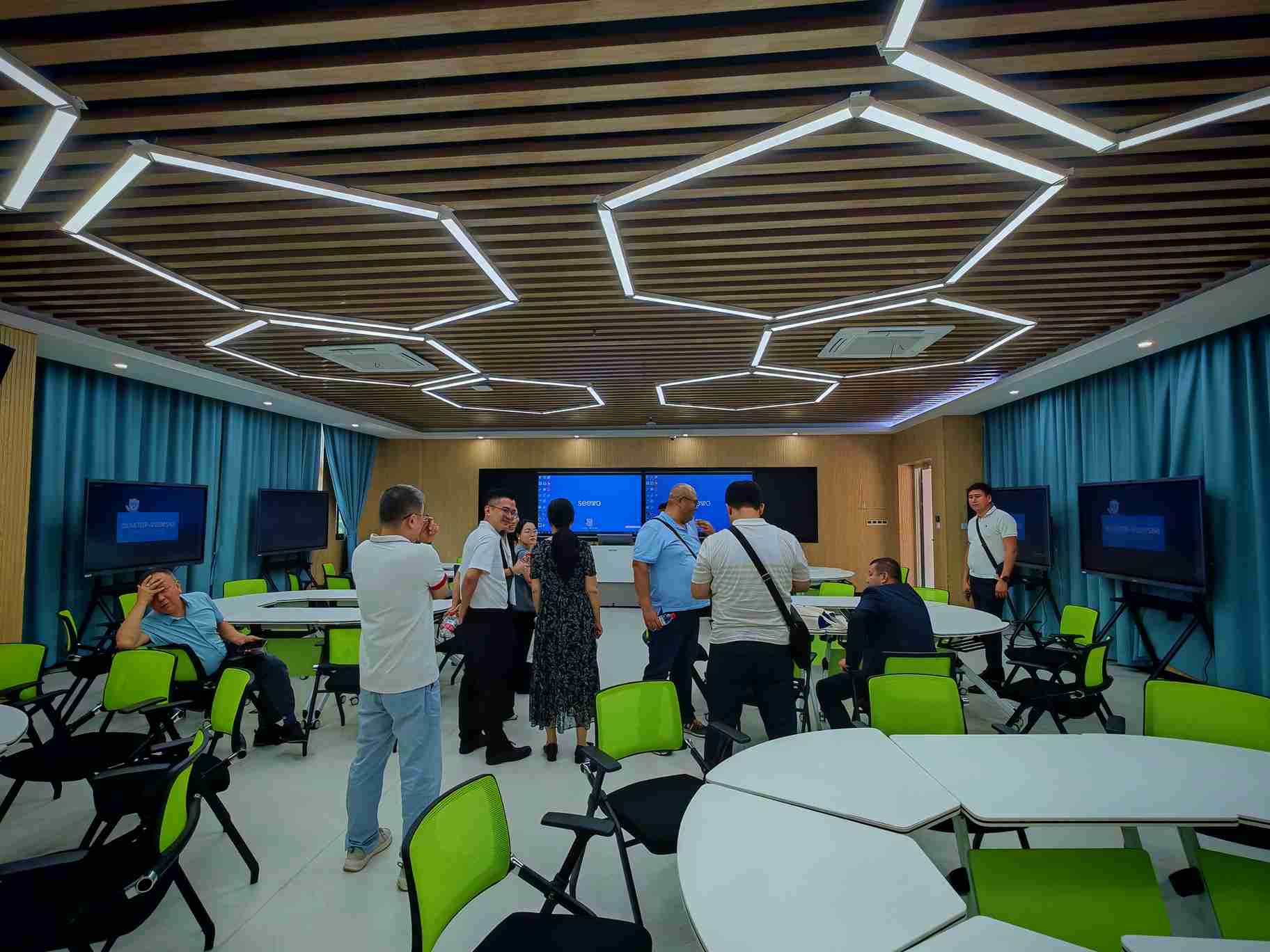 Delegates touring a collaborative learning space