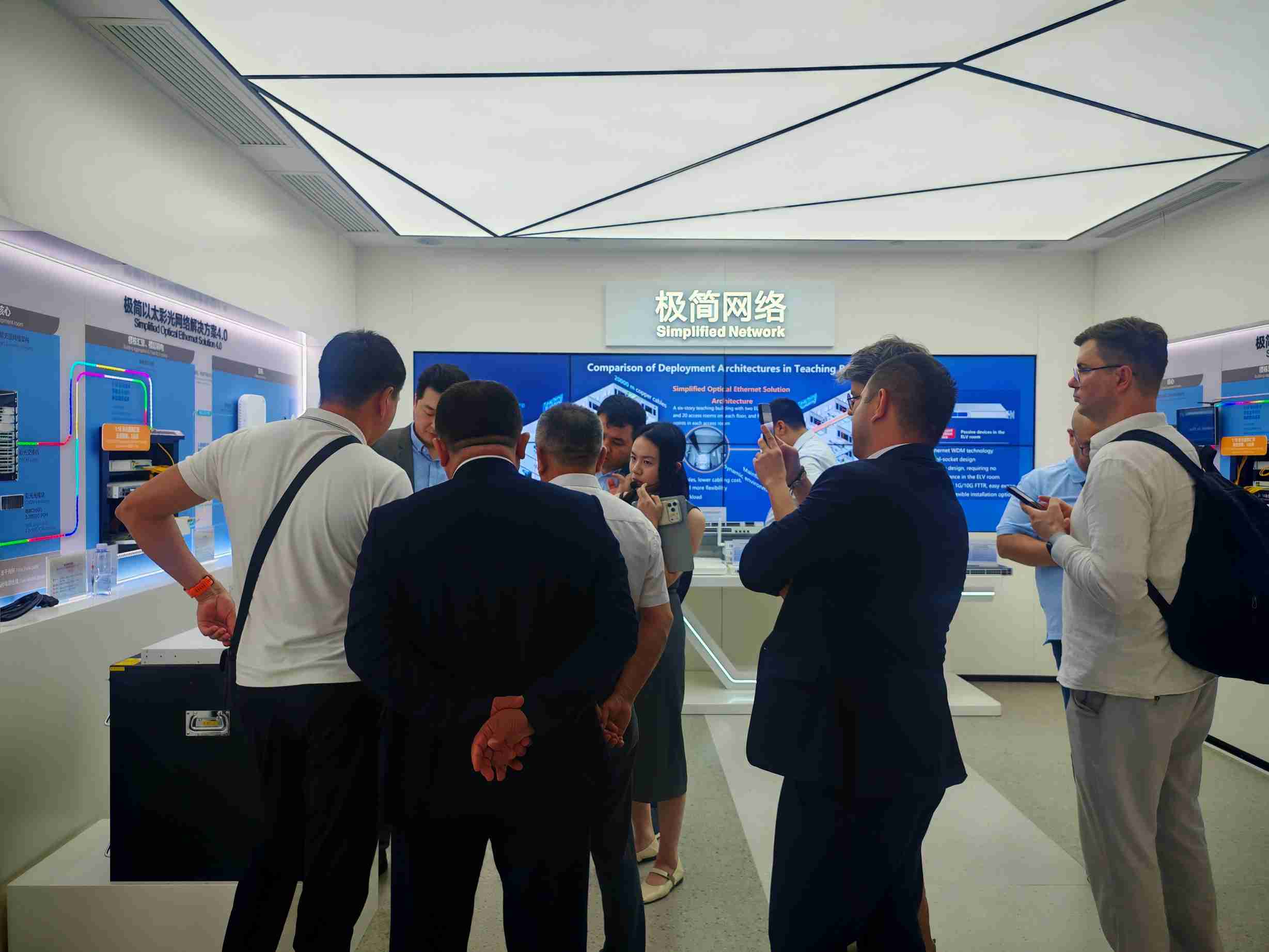Delegates touring the Simplified Network exhibit