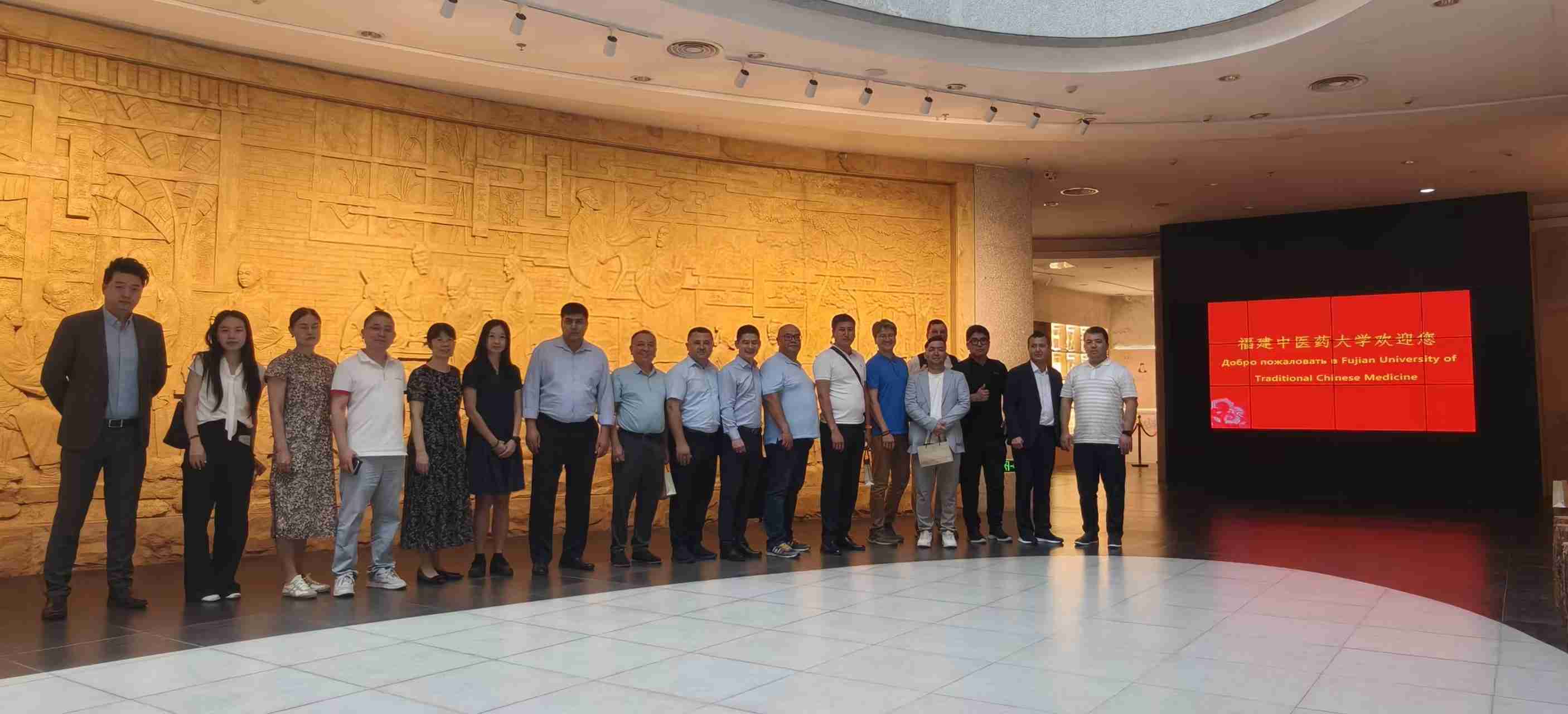 Delegation group photo at Fujian University of Traditional Chinese Medicine lobby