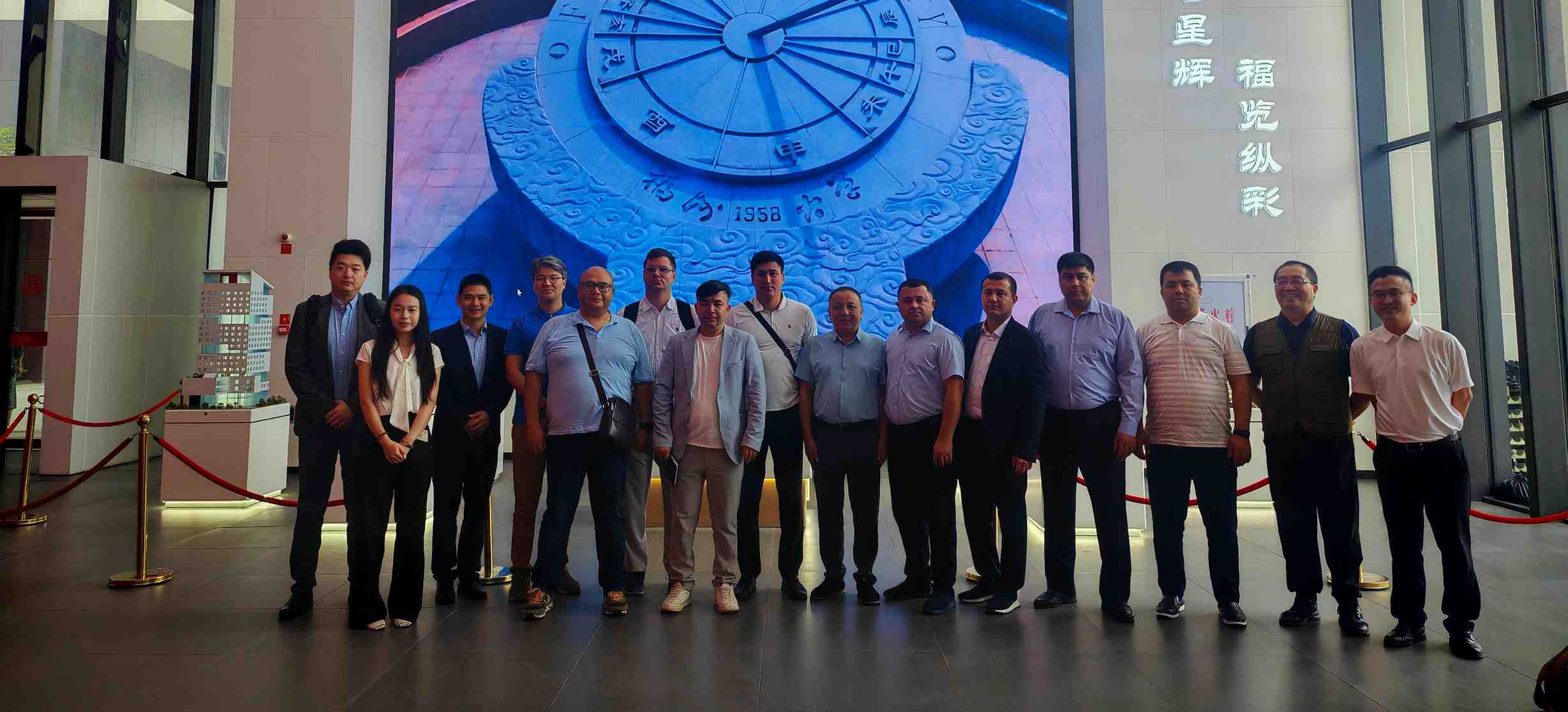 Delegation group photo at Ruijie headquarters lobby