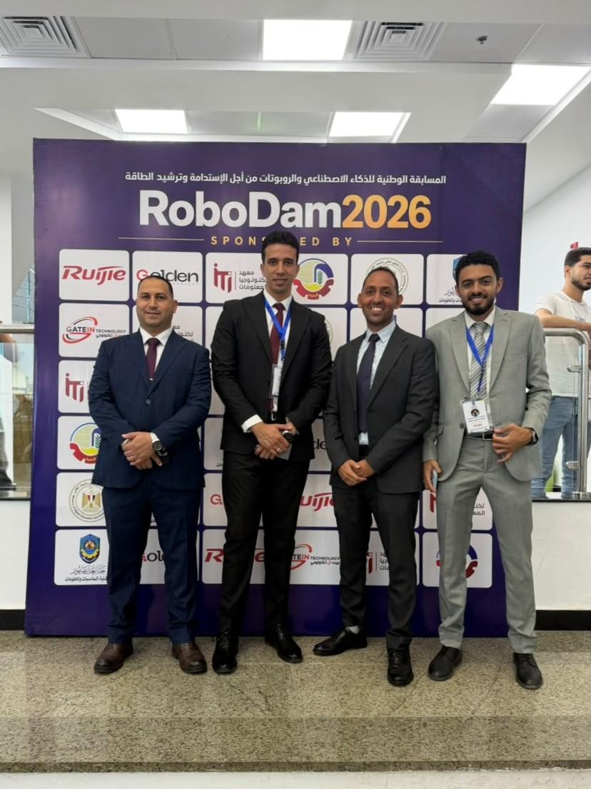 Ruijie Networks team at the RoboDam 2026 sponsor wall